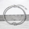 Knoten Armband in Gold & Silber