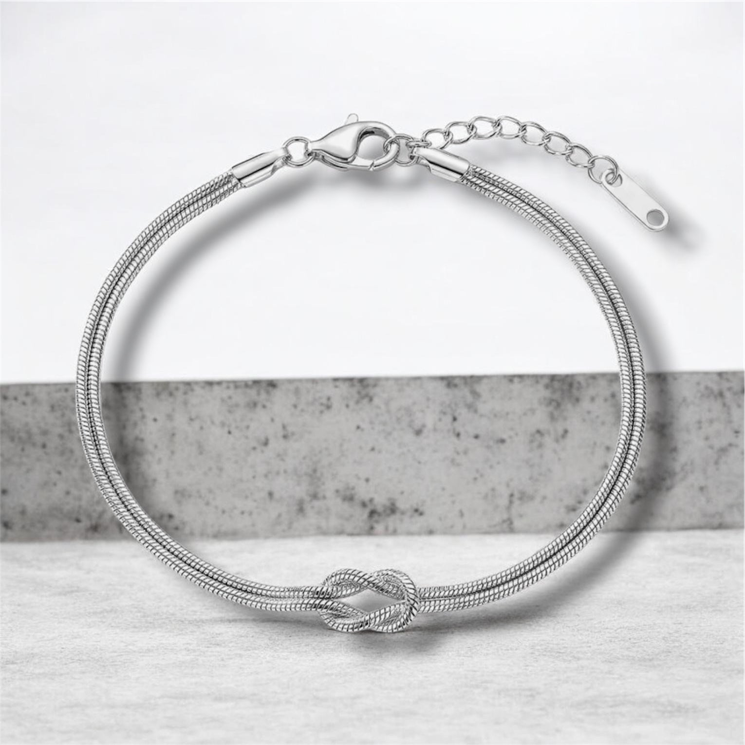 Knoten Armband in Gold & Silber