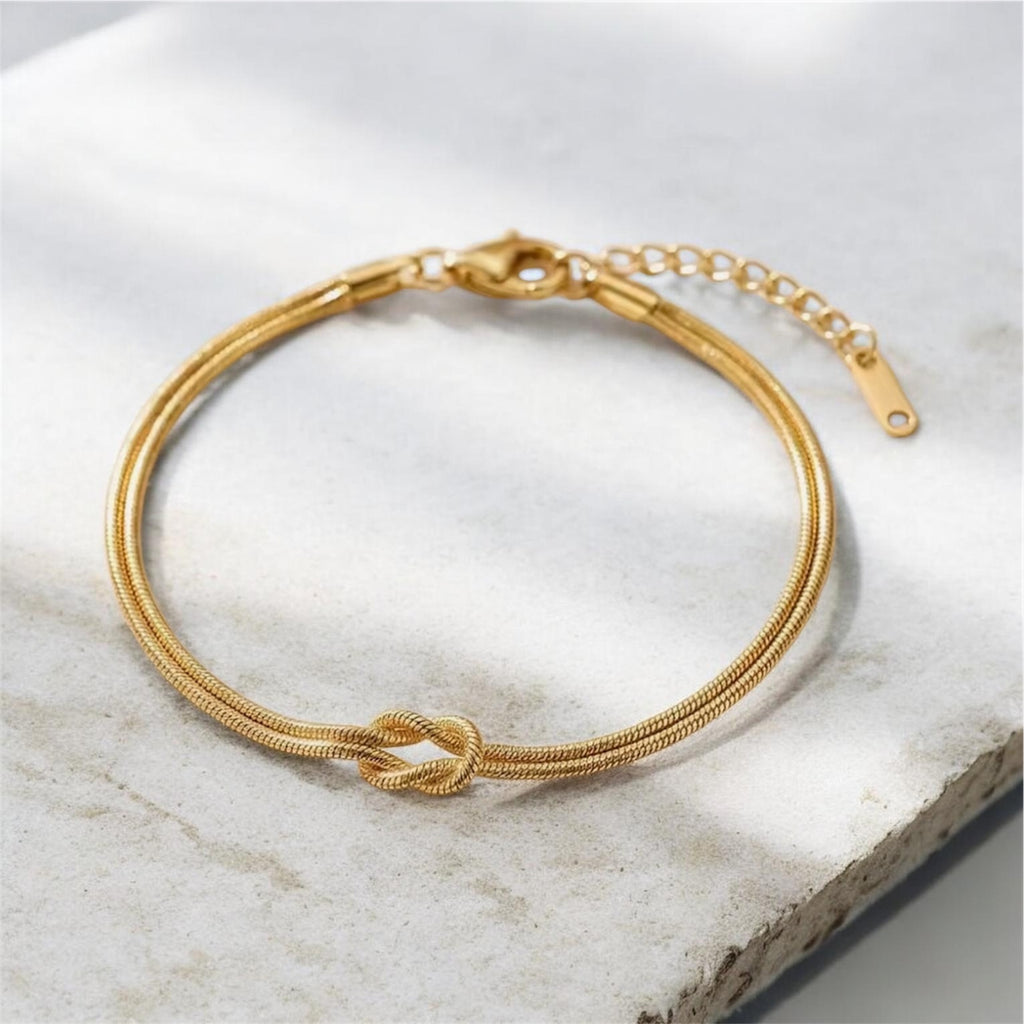 Knoten Armband in Gold & Silber