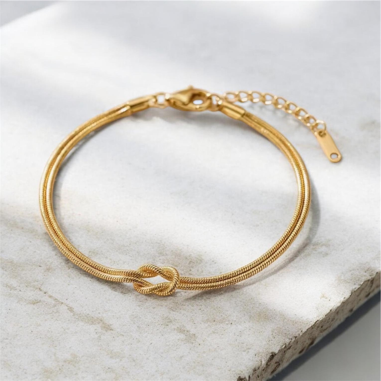 Knoten Armband in Gold & Silber