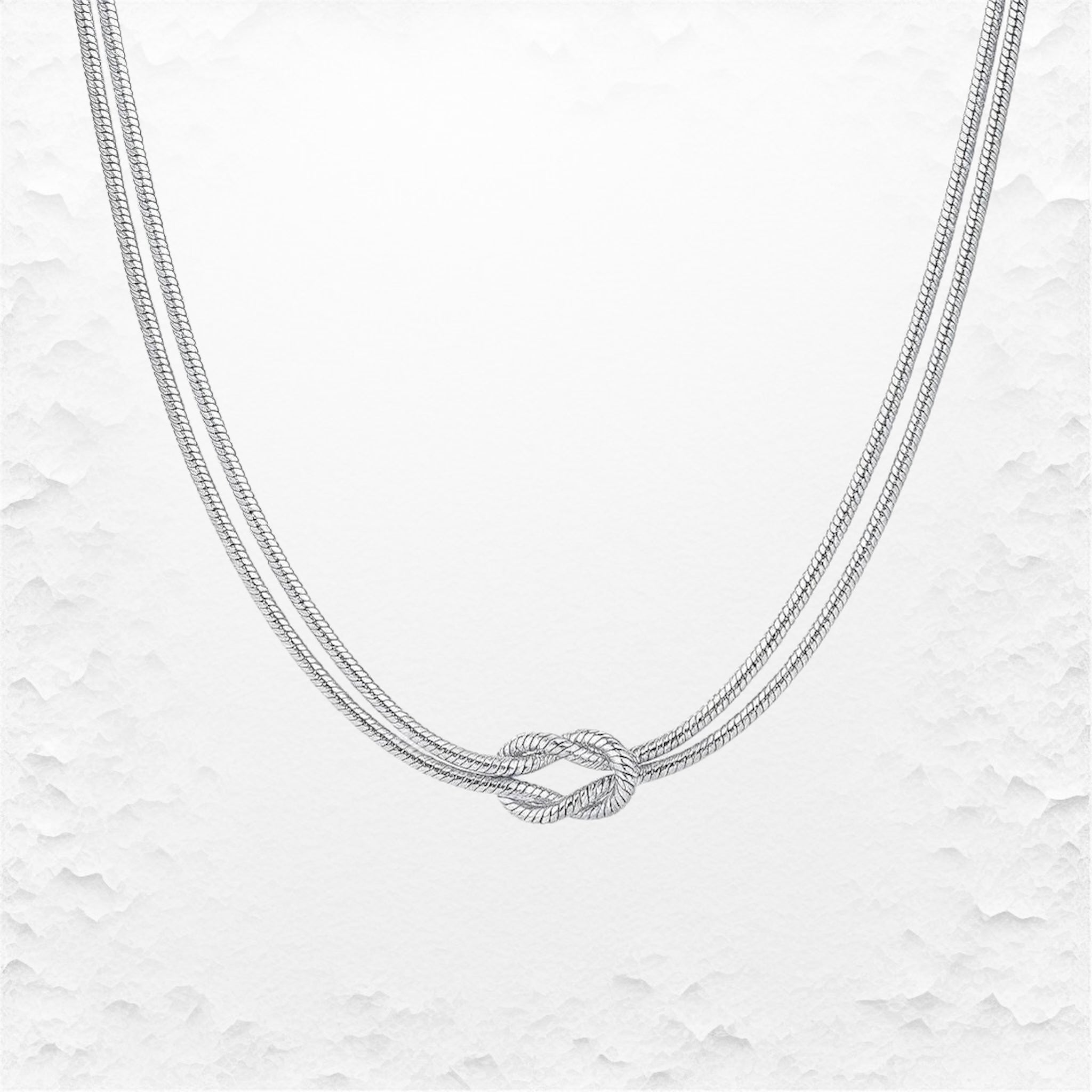 Knoten Halskette in Gold & Silber